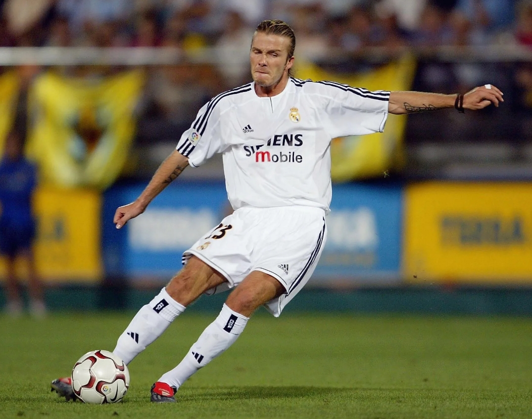 David Beckham a Luís Figo